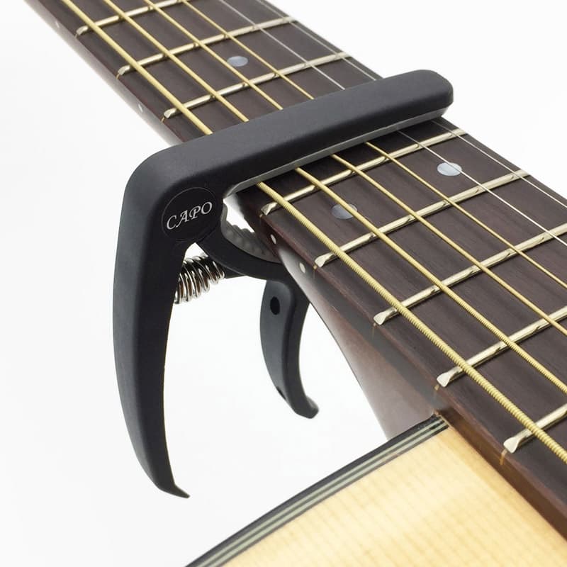 Capotraste Braçadeira Guitarra E Violão Aço E Nylon +Palhetas Brindes