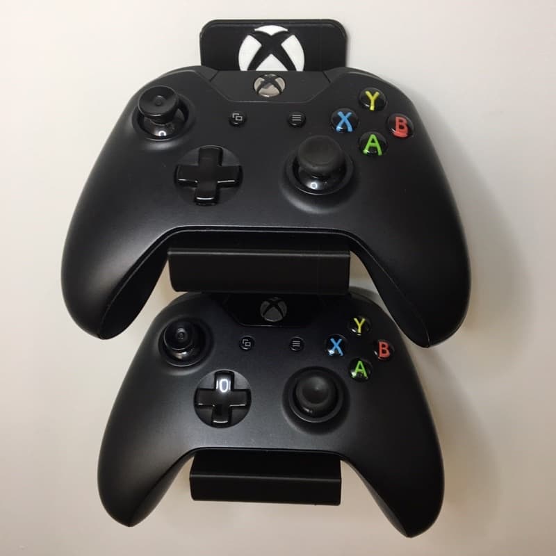 Suporte de parede para 2 controles de videogame