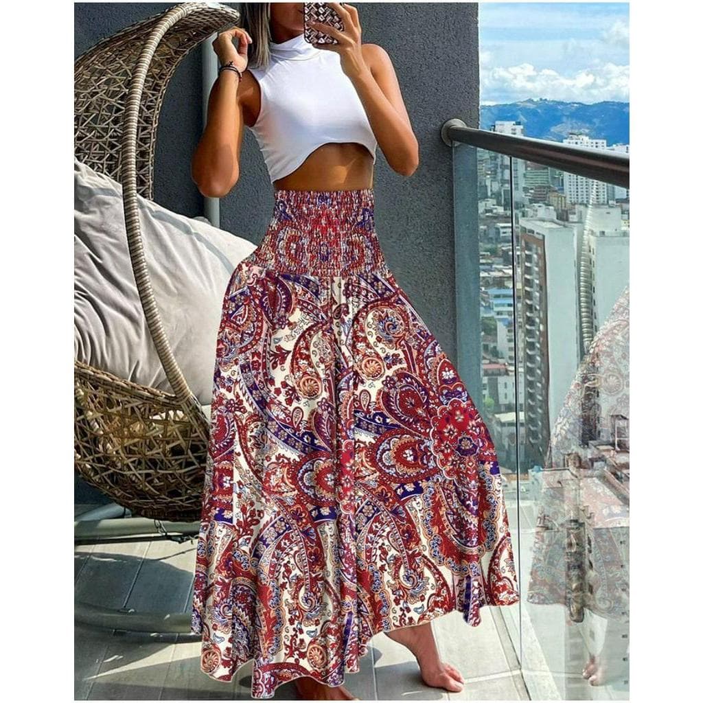 2024 Saia de cintura alta de outono de cintura alta saia feminina de cintura grande Moda Floral Impressão Praia Estilo férias feminina Saia feminina