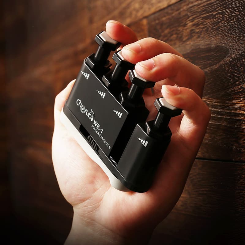 Dispositivo de treinamento da força dos dedos da guitarra Dispositivo de treinamento da força dos dedos do Piano Exercitador dos dedos Exercitador dos dedos do Ukulele Exer