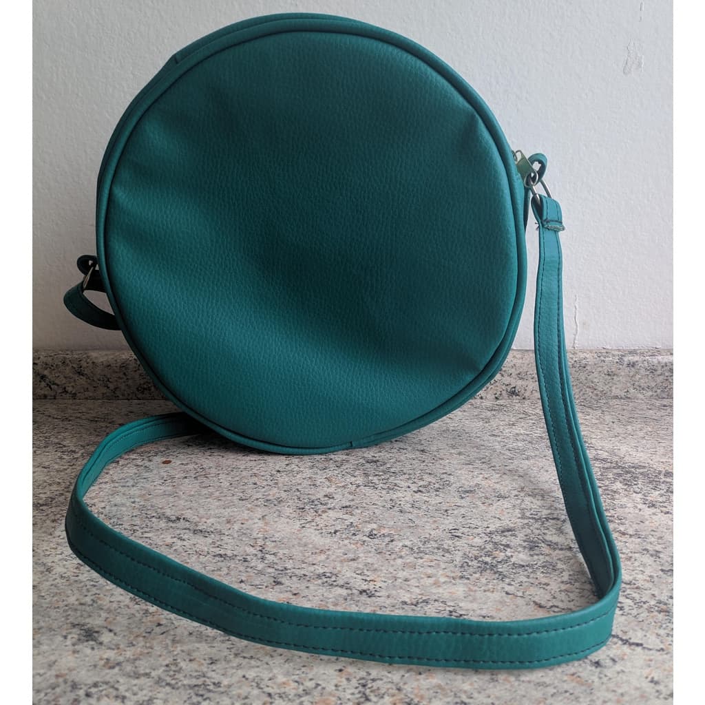 Bolsa redonda de corino verde