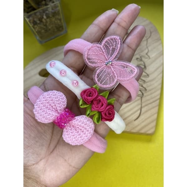 kit com 3 laços faixinhas de bebê Rn saída de maternidade menina