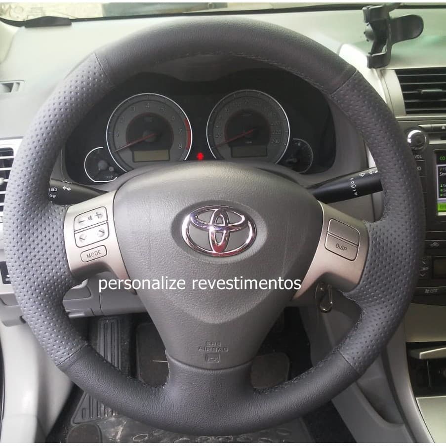 capa de volante costurada Corolla 09+