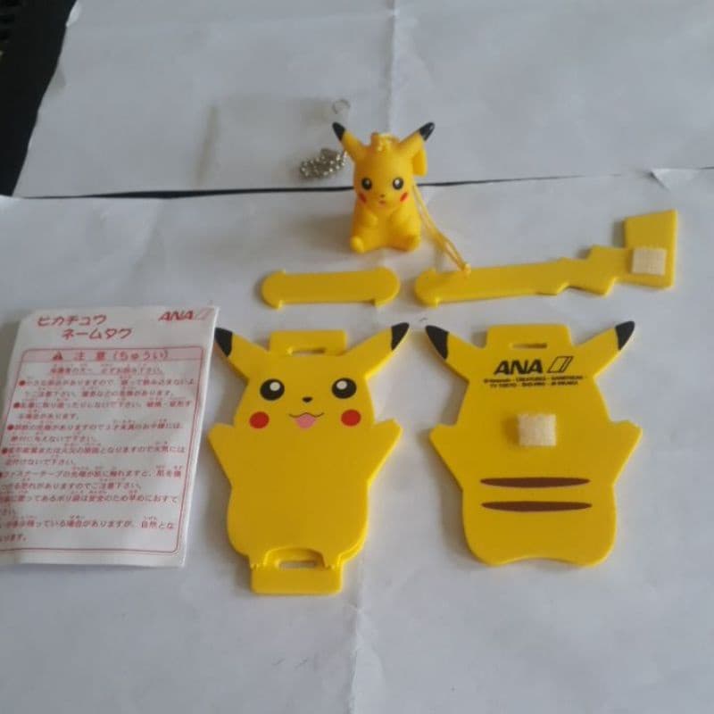 tag de mala e boneco Pikachu ANAJapão