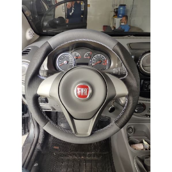 capa de volante costurada novo Palio e Gran Siena