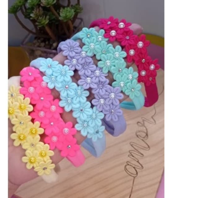 Laço na faixinha de bebê Rn com flores/saída maternidade/tiaras de bebê