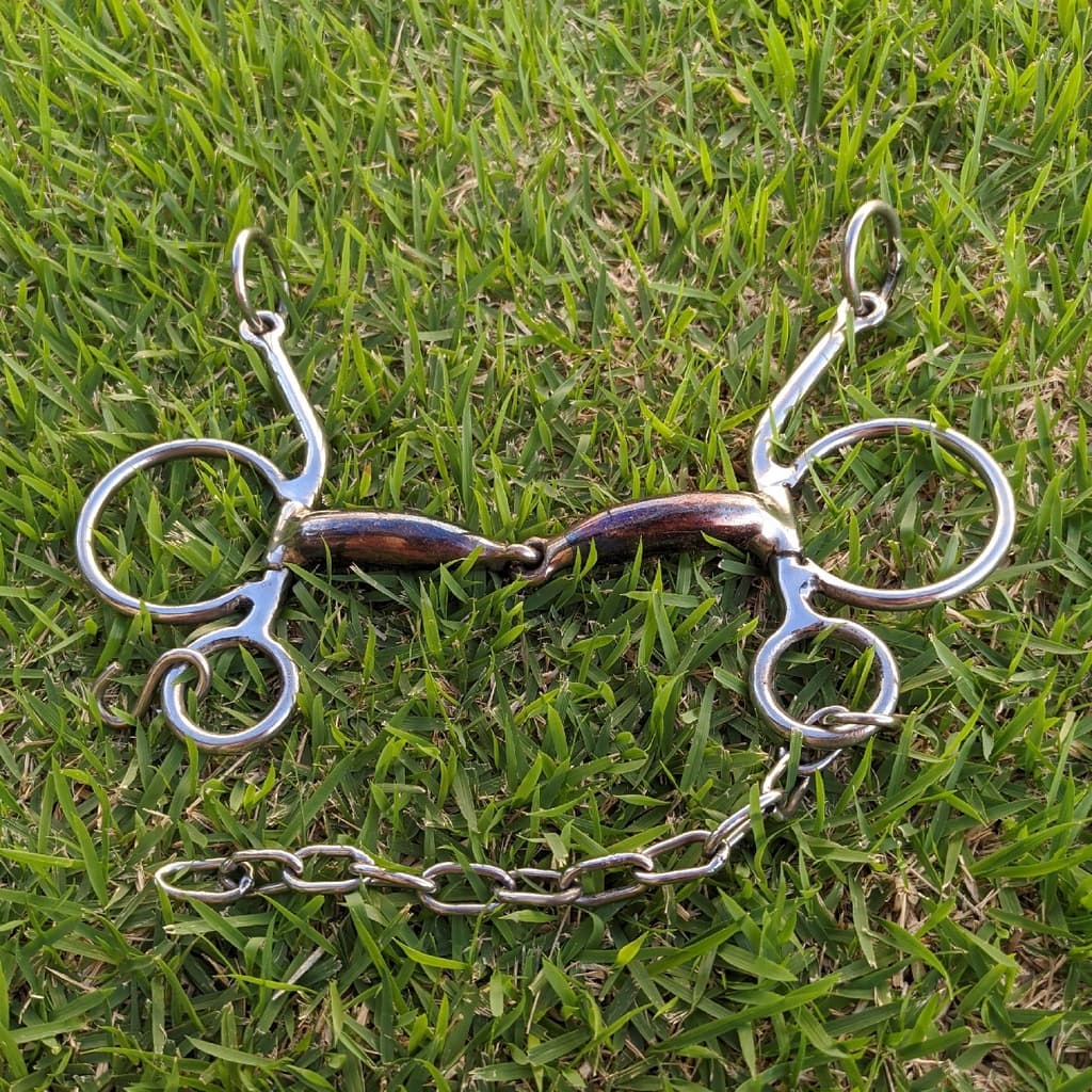 Freio bridão pra Cavalo Equinos Muares Caracol em Inox Bocal Grosso De Ferro Articulado - oferta