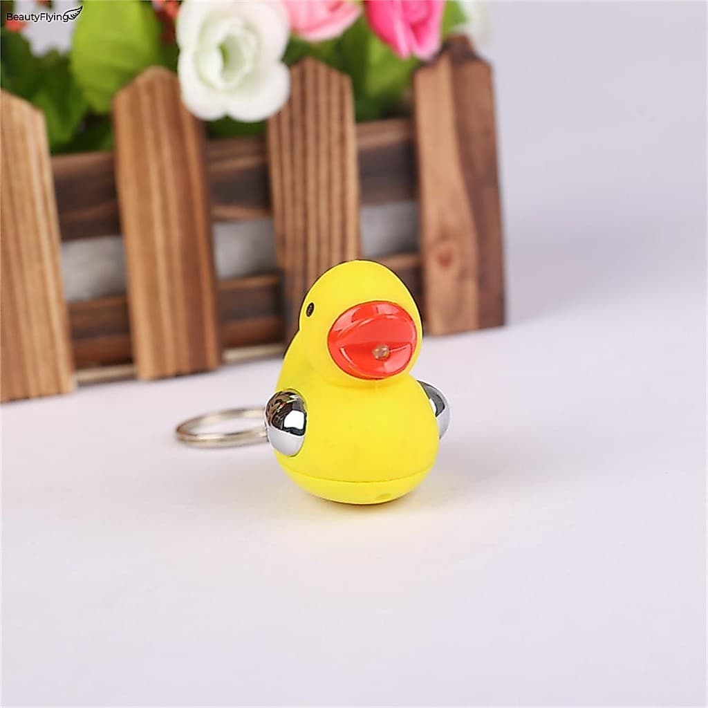 Novidade Elétrica Chaveiro Brincadeira Choque Elétrico Pato Utilitário Gadget Mordaça Presente Para Amigos Da Família