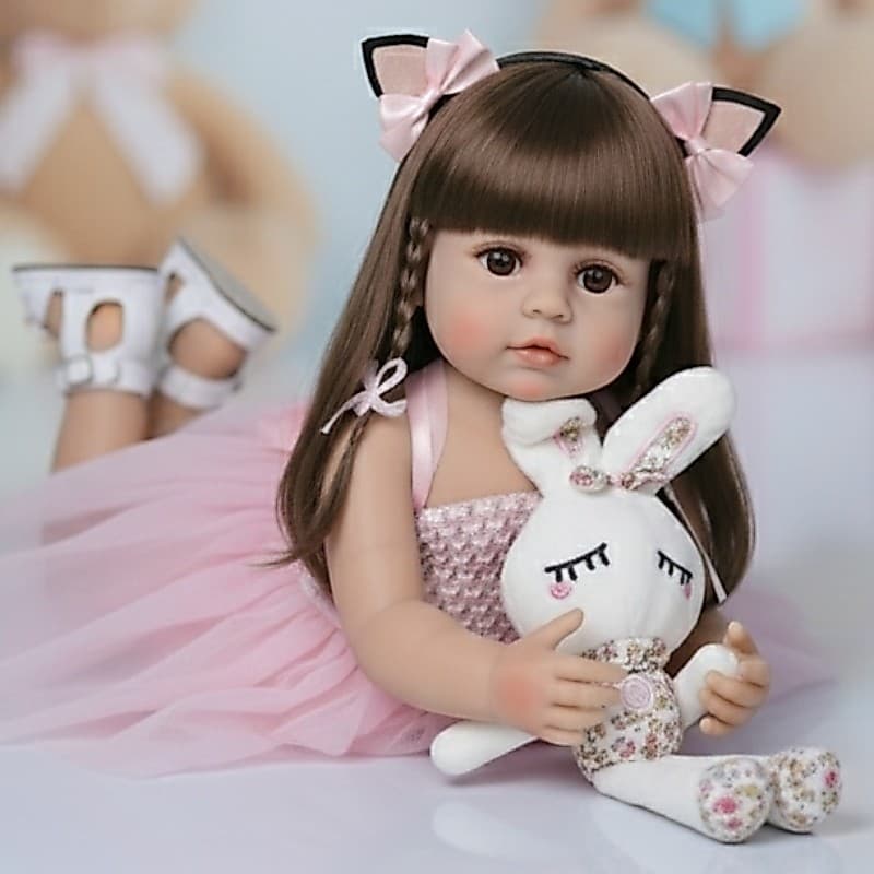 Boneca Reborn De Silicone + Bichinho de pelúcia New Happy
