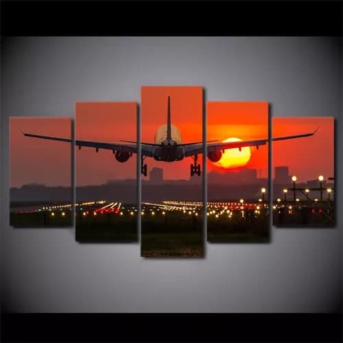 quadro decorativo avião aeroporto por do sol