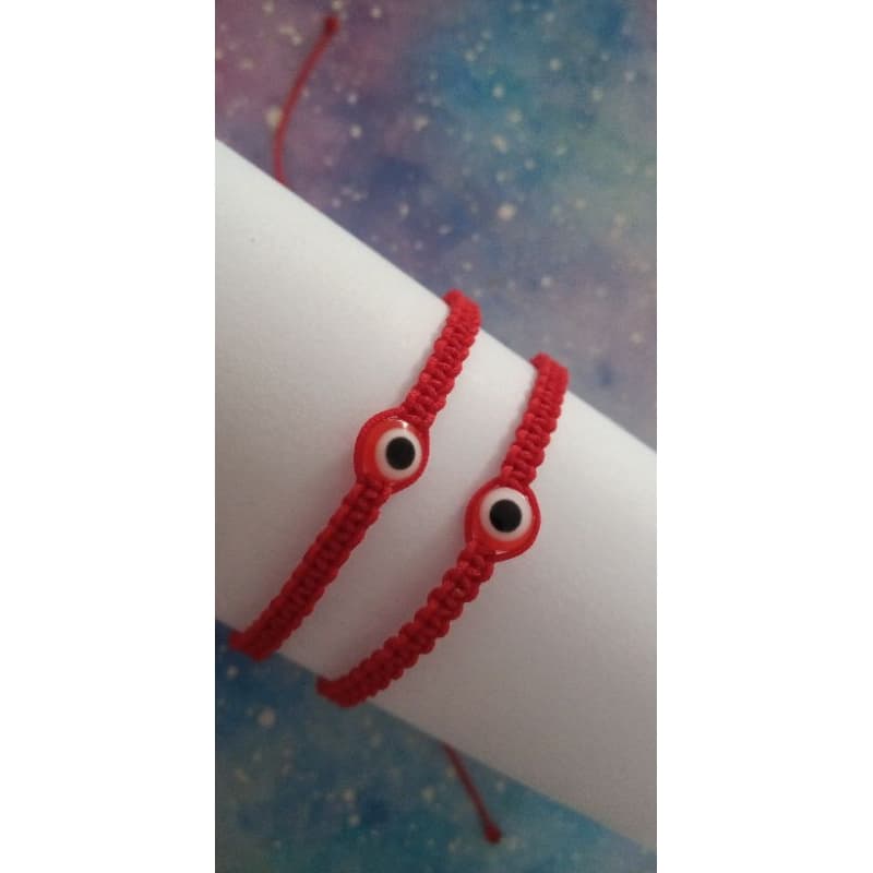 Pulseira de proteção em macramê vermelha com olho grego