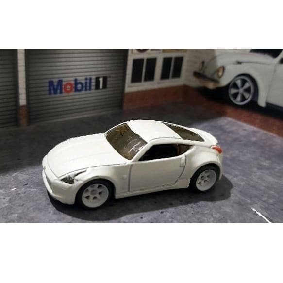 HOT WHEELS NISSAN Z COM RODAS ESPECIAIS PNEUS DE BORRACHA ESCALA 1.64 TAMANHO 7CM LOOSE SEM EMBALAGEM