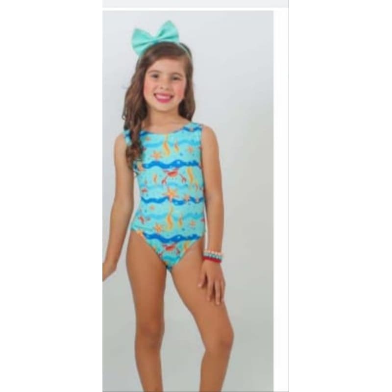 Moda praia infantil, maiô regata estampado, roupa de praia menina.