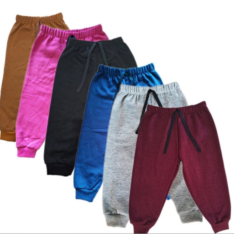 Calça de moletom infantil e juvenil com punho e elástico na cintura.
