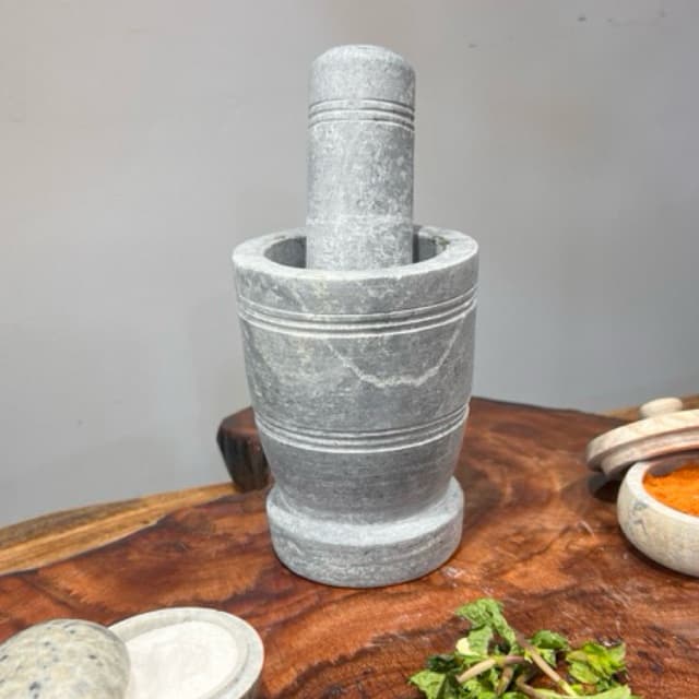 pilão e socador pedra sabão