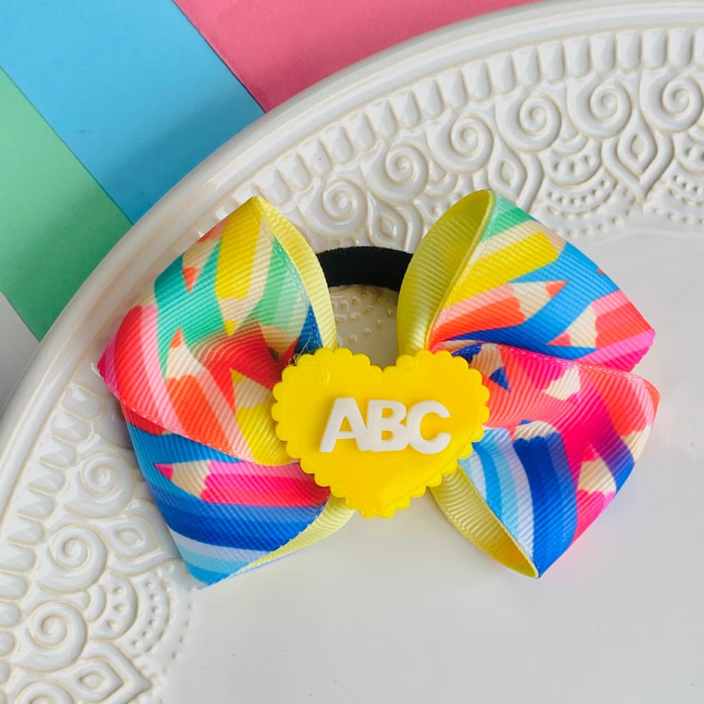 Laço infantil na xuxinha  / Laço azul marinho  /Laço Vermelho /Laço Amarelo / Laço escolar abc coração