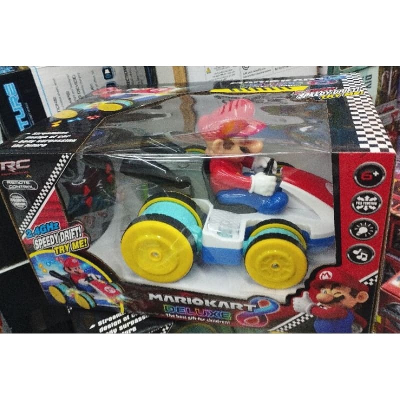 carrinho  com controle remoto super Mario tem som e luz bater e volta com controle remoto recarregável.