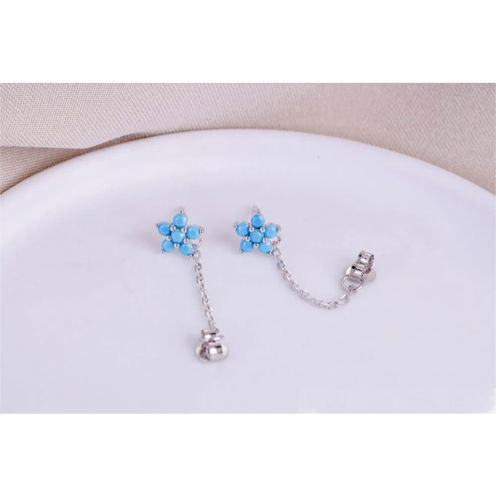 BRINCO FLOR 5 PETALAS AZUL TURQUEZA COM CORRENTE EM PRATA 925