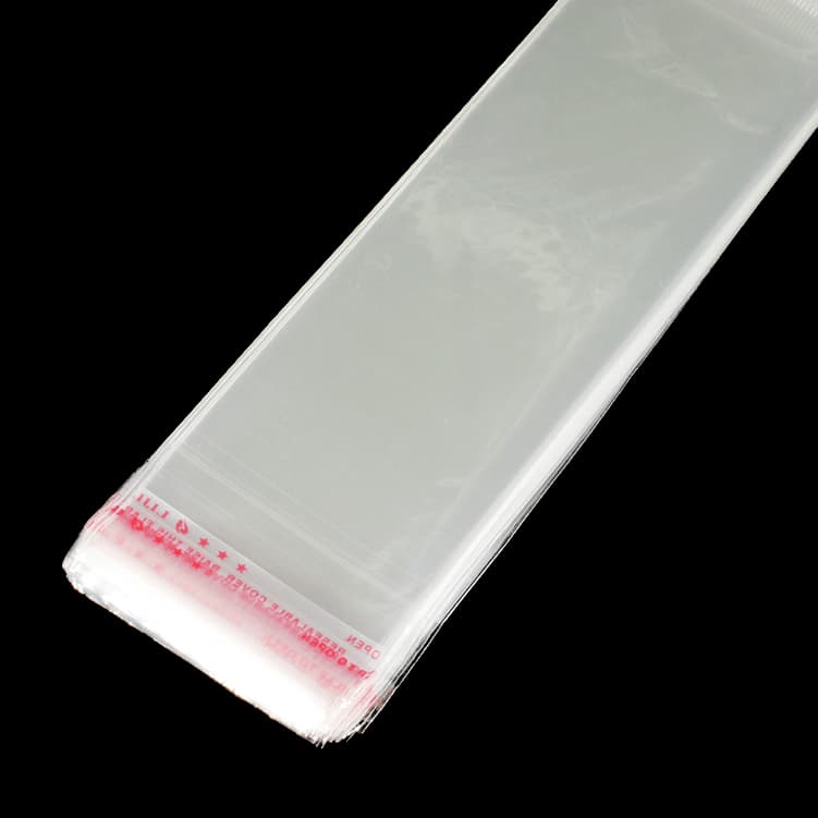 Saco Celafone Adesivado Transparente 5x22cm S/Furo Pacote C/100Unidades Ref:MC-0029