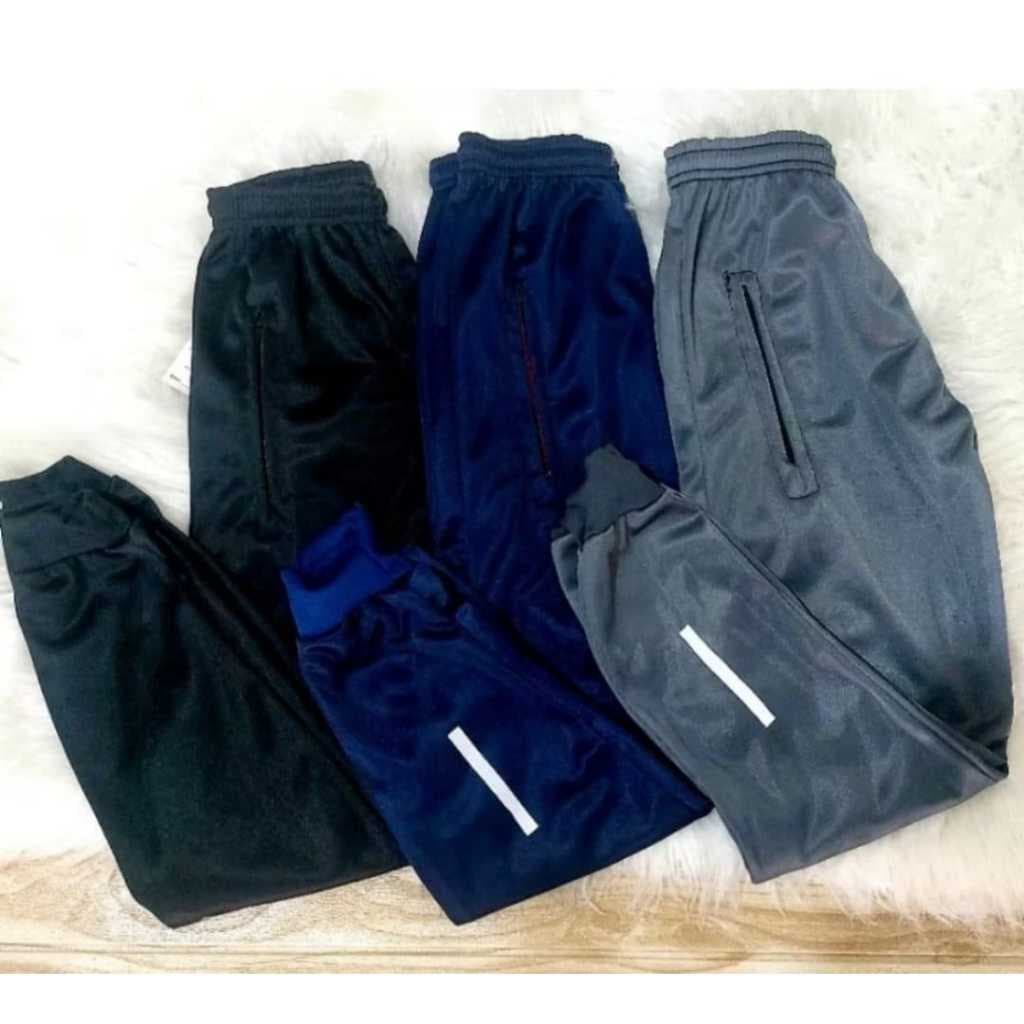 Kit 02 Calça Jogger Infantil Juvenil Driy-Fit Corta Vento Menino  Com Bolso Tradicional Tendência Casual Multicolorido