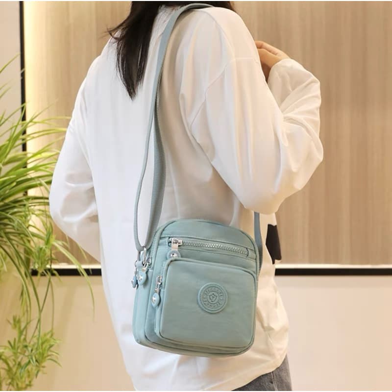 Bolsa Feminina Pequena Crossbody Transversal Impermeável 4 Compartimentos