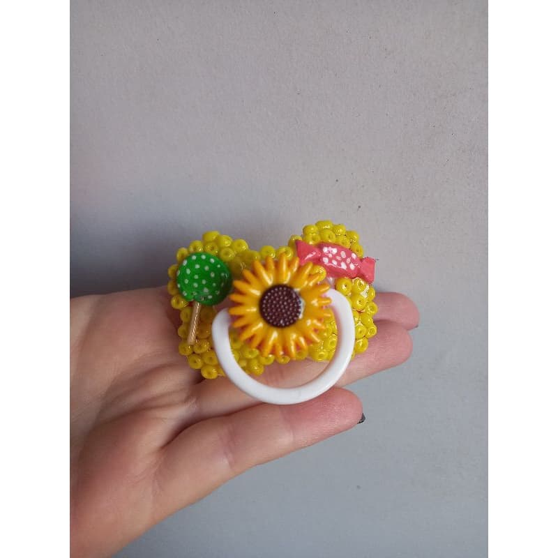 Chupeta amarela erê de Oxum 🌻