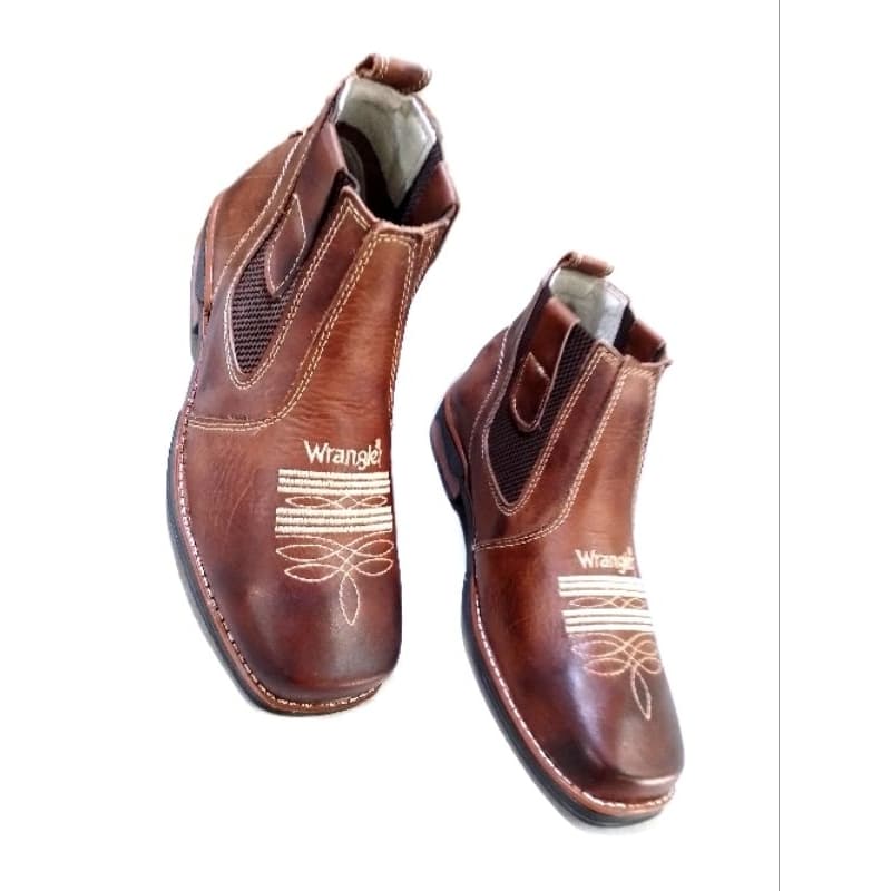 botina mateira wrangler, em couro legítimo.