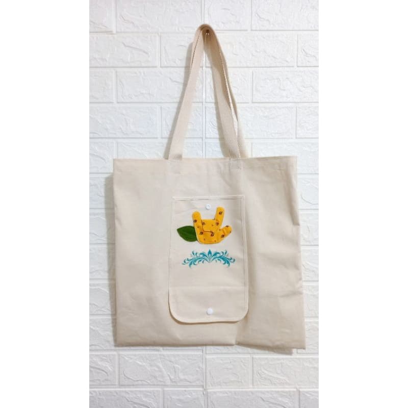 Sacola versátil com bolso