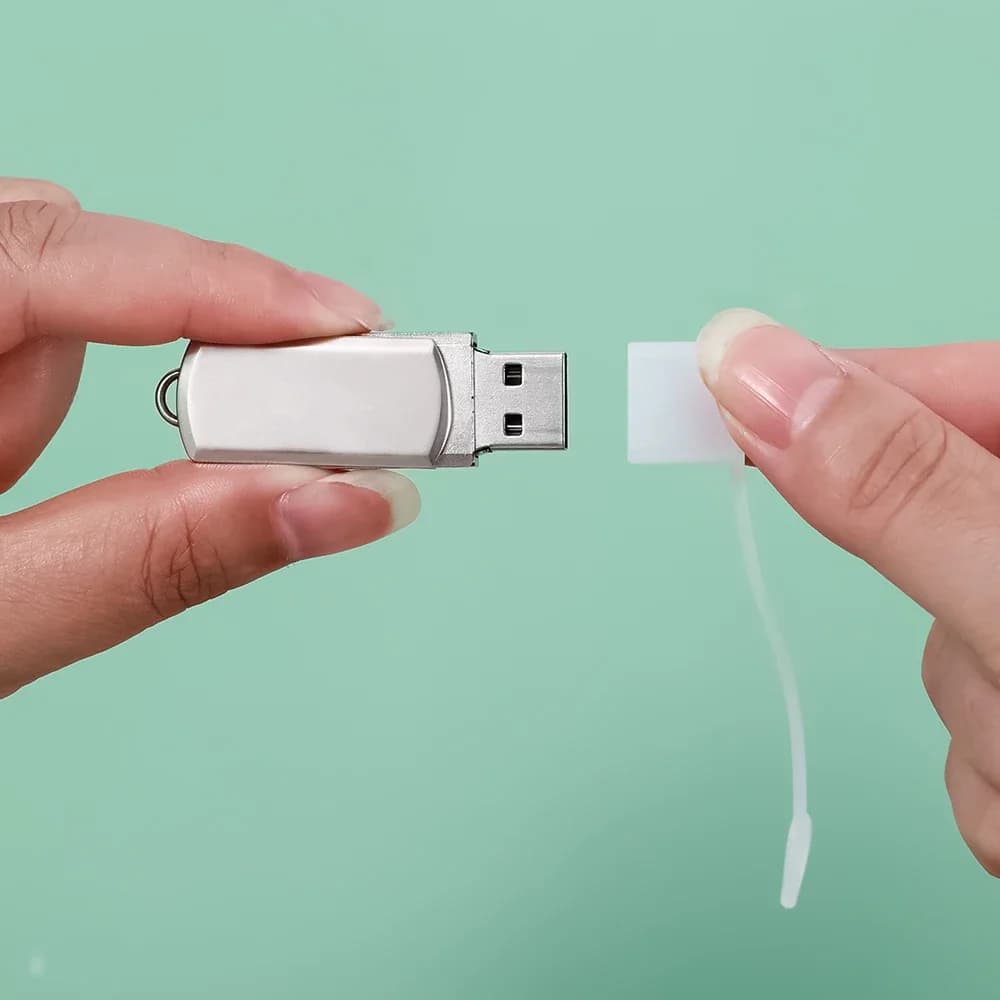 Protetor para ponta de cabo USB /  Tipo-C ou HDMI, transparente, com alça, 1 unidade.