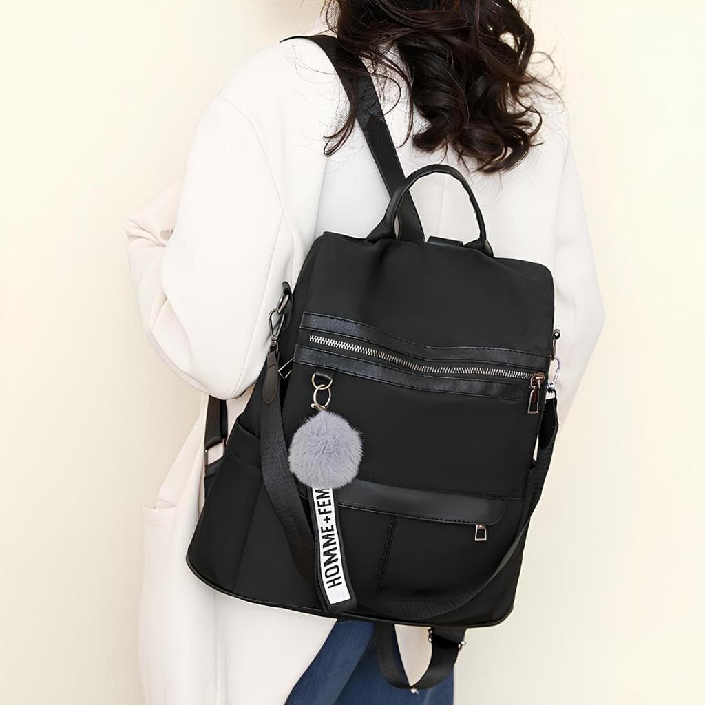 Bolsa Mochila Feminina Alça Transversal e Costas Impermeável com pompom 123