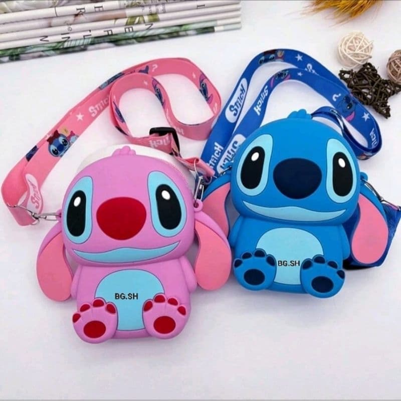 Bolsinha infantil silicone, stitch con alça regulável piquena.