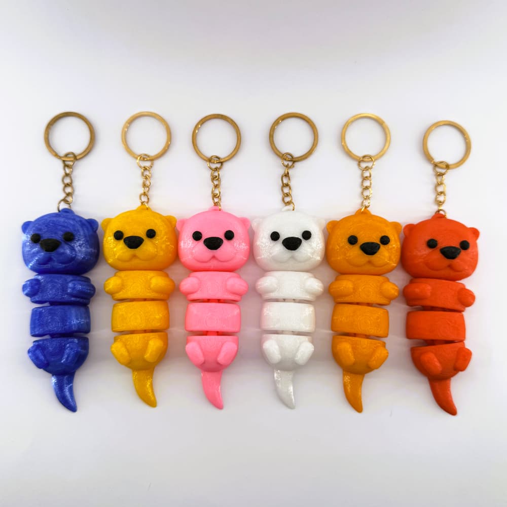 Chaveiro Lontrinha Articulada PETG Premium Branca, Azul, Rosa Argola Italiana Fofinha e Resistente