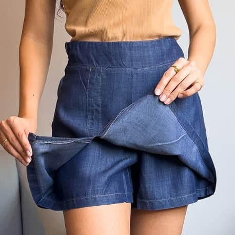 Short saia jeans feminino cintura alta com zíper