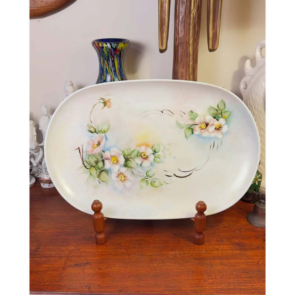 Antiga travessa em porcelana Real.