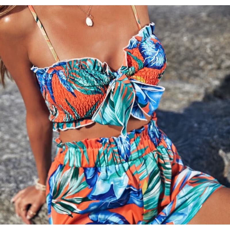 Cropped estampa tropical c/ amarração frontal