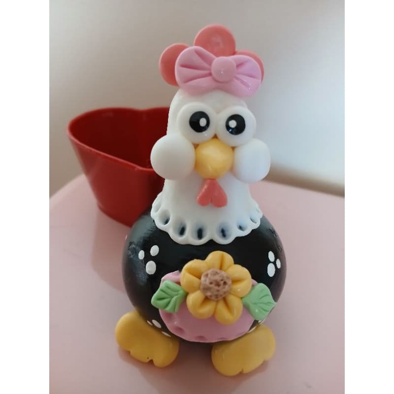 Galinha de cabaça com avental.