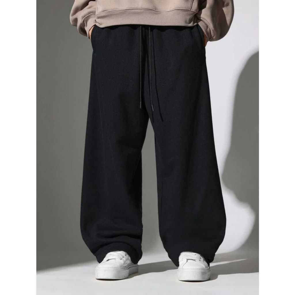 calça baggy moletom flanelada estilo larga possui 3 bolsos e regulagem na cintura