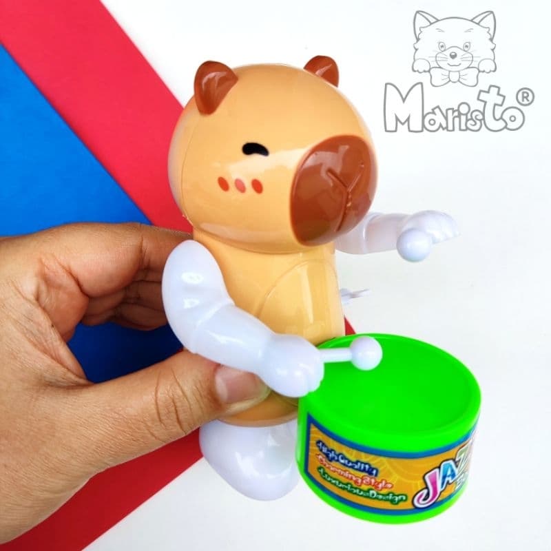 Mini Brinquedo Capivara a Corda que Mexe e Toca Tambor