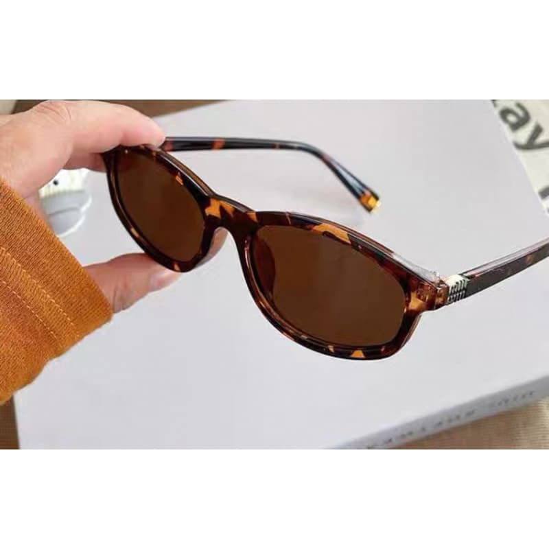 oculos novo sol armaco tartaruga marro branco