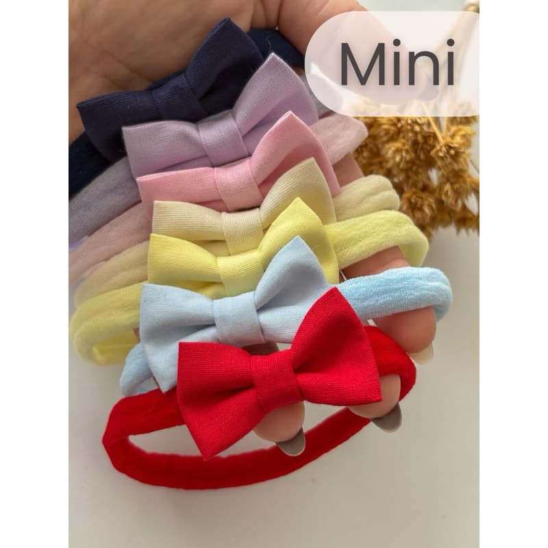 Laço Mini Bebê na faixa meia de Seda Infantil