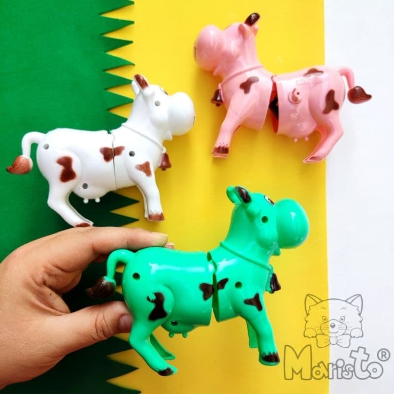 Kit 2 Mini Brinquedos Vaquinhas a Corda que Pulam