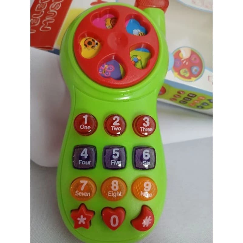 Brinquedo infantil Telefone Musical Linha Baby toca música/+ 24 meses