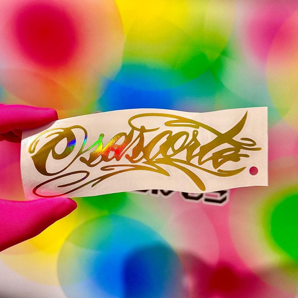 15X5,4cm l Adesivo l Dourado Holográfico l Osascorte