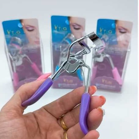 Curvex Curvador De Cilios Cor Preto E Colorido ,Com Borrachinha extra.