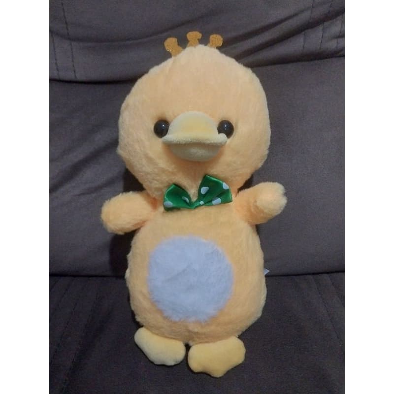 Brinquedo Pelúcia Pato com coroa e gravata patinho amarelinho BR Machine