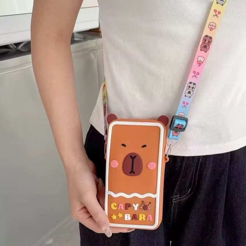 Bolsa Porta Celular Capivara Infantil com Alça Estampada Dinossauro Unicórnio