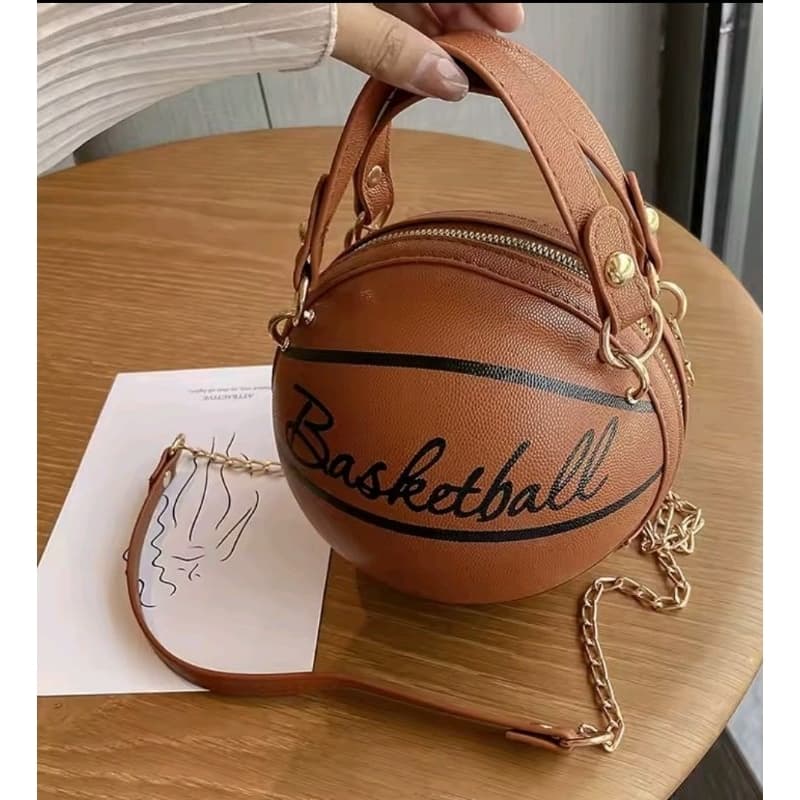 bolsa no formato de bola de basquete marron