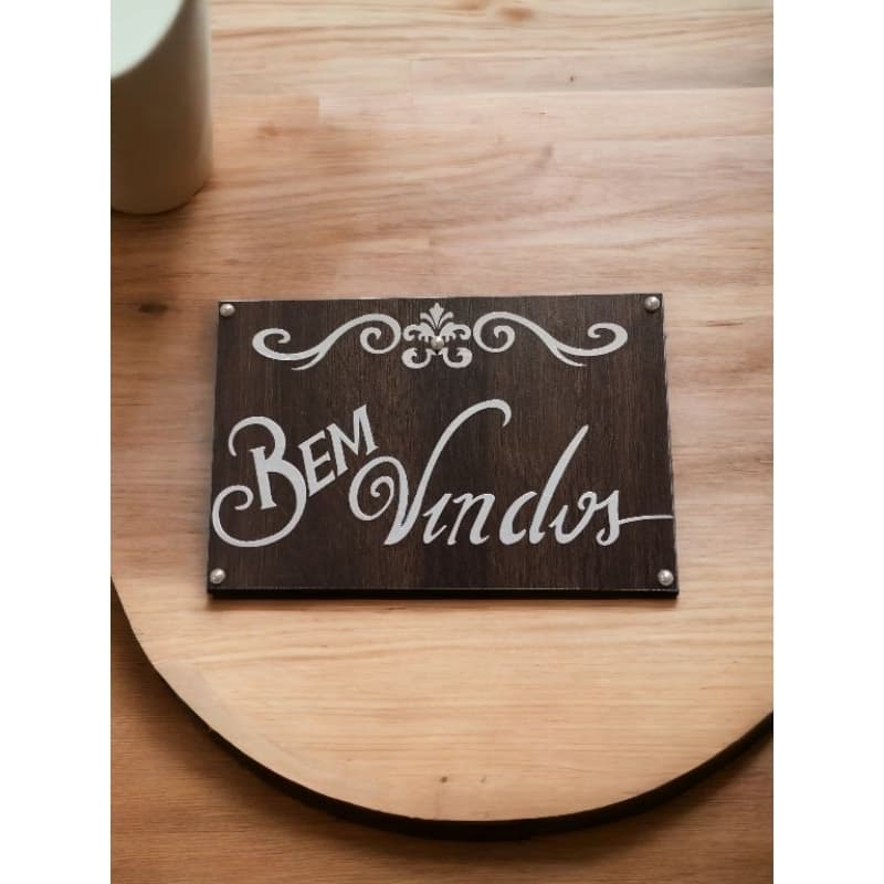 Placa decorativa bem vindos.