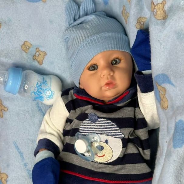 bebe reborn abigail menino olhos azuis
