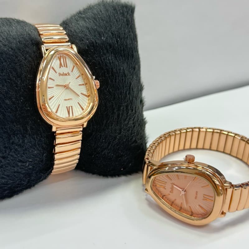 Relógio Feminino em Forma de Gota com Mola–Diamantes e algarismos romanos que destacam um charme fashion
